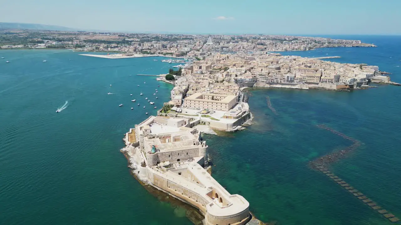 Ortigia island and Syracuse Baroque City in Sicily Italy Aerial 4k