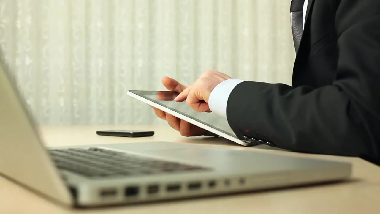 Hand Touching Tablet Computer Surface Touchscreen 2