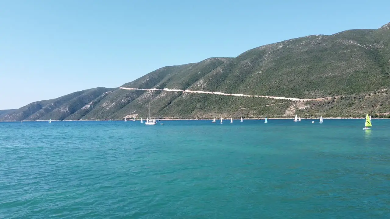 Wind Surfers Sail at Vasiliki Lefkada Island Greece Aerial Forward