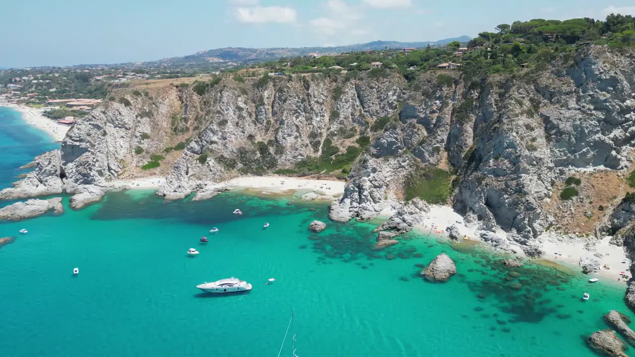 Capo Vaticano Beaches Boats and Blue Mediterranean Sea in Calabria South Italy Aerial 4k