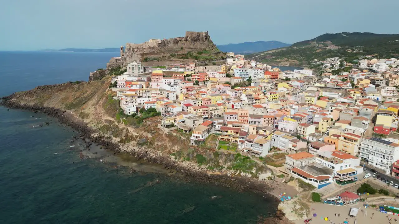 Castelsardo beach and old castle in Sardinia Italy 4k Drone Aerial