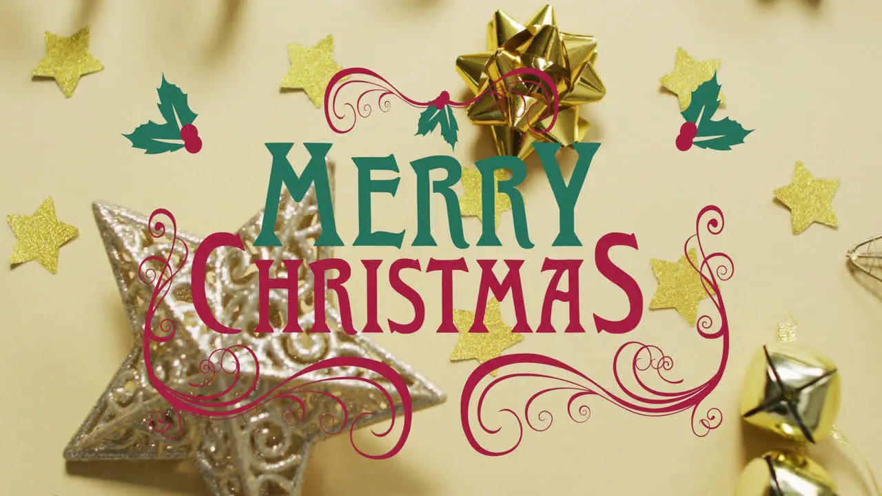 Animation of merry christmas text and christmas decorations on table