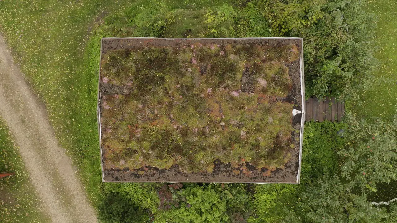 Backforward drone shot of the green roof