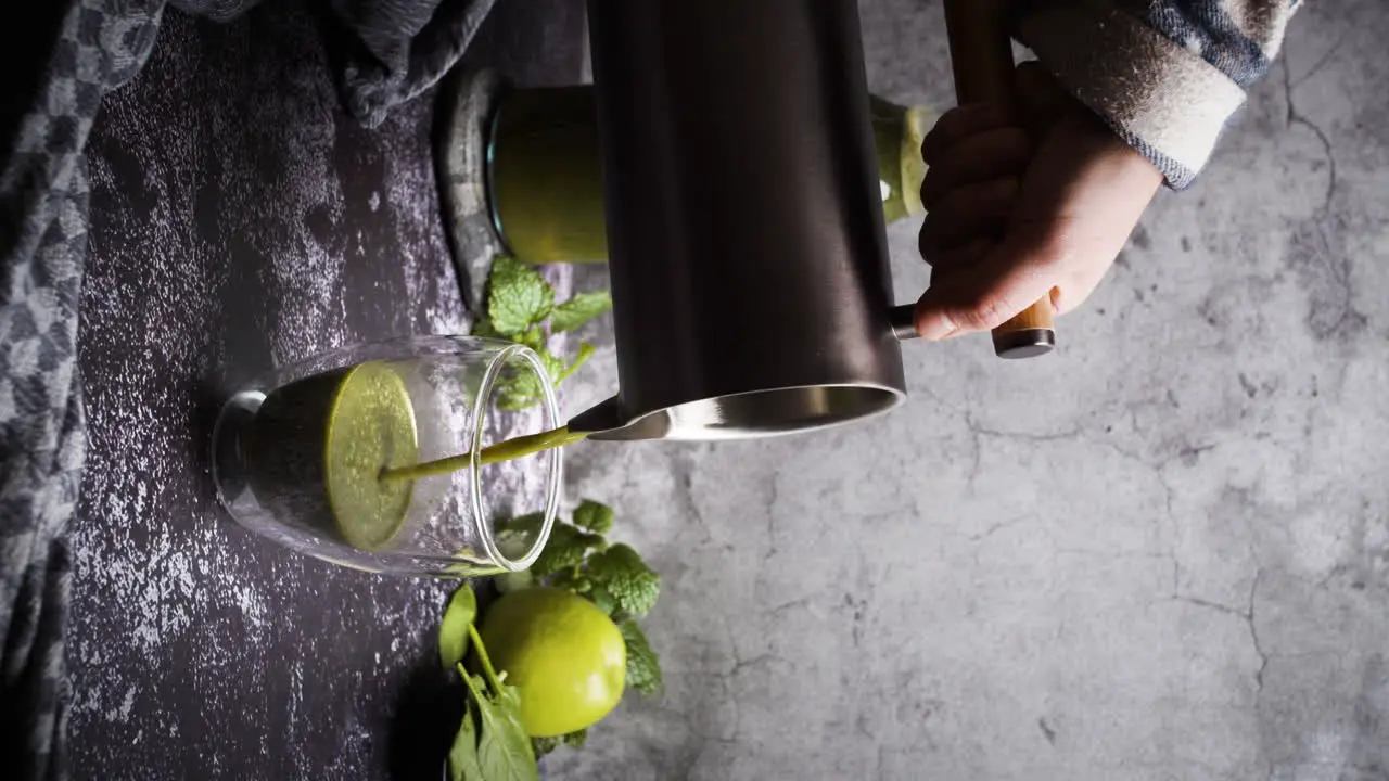 Vertical video of green smoothie or juice