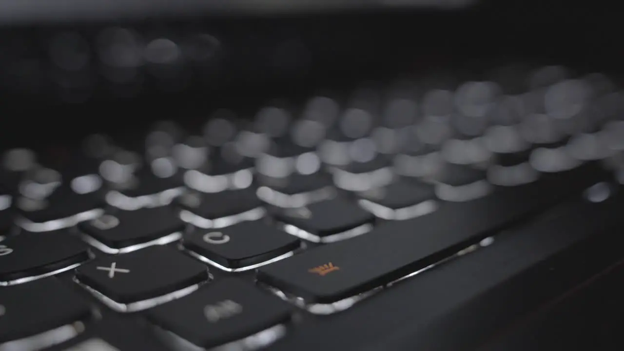 Macro Shot Of Sound Engineering Audio Mixer Turning On Keyboard Light