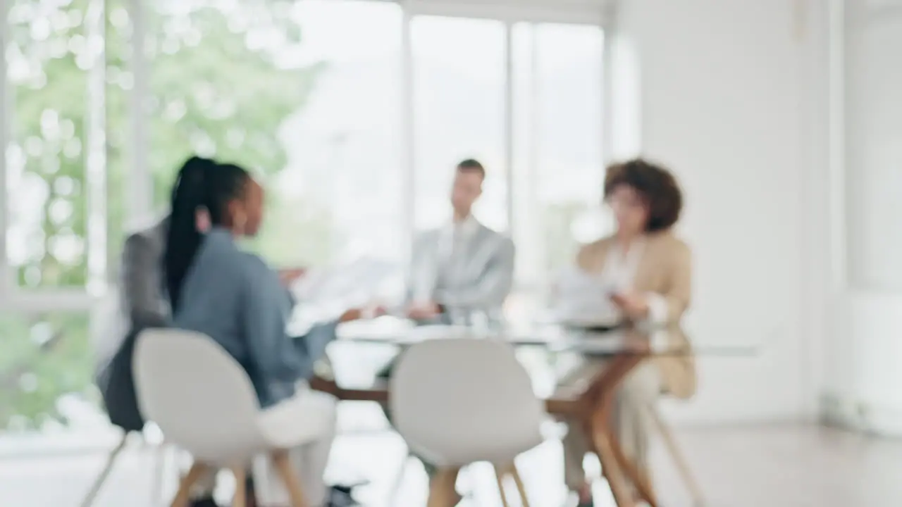 Business meeting people in blurred office