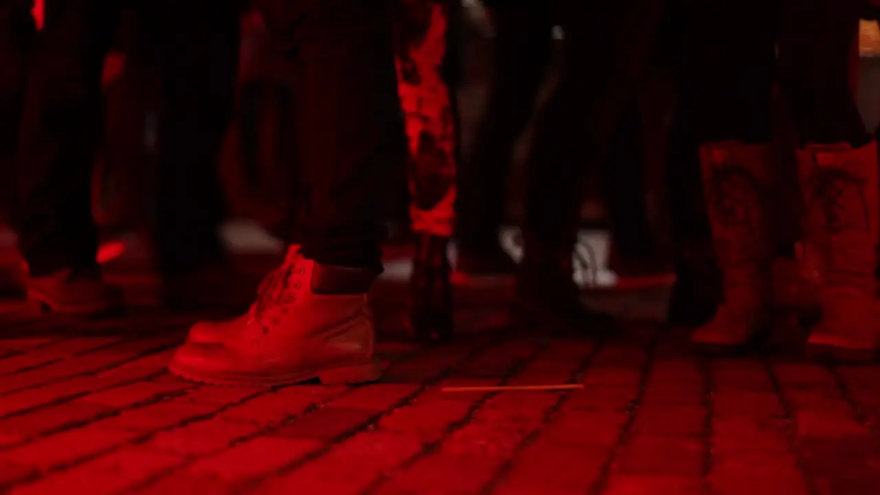 People walking during an event in an urban city at night