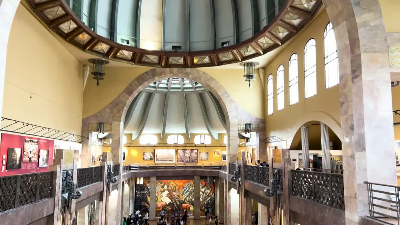 slow motion shot of people enjoying art exhibition at palacio de bellas artes in mexico city downtwon