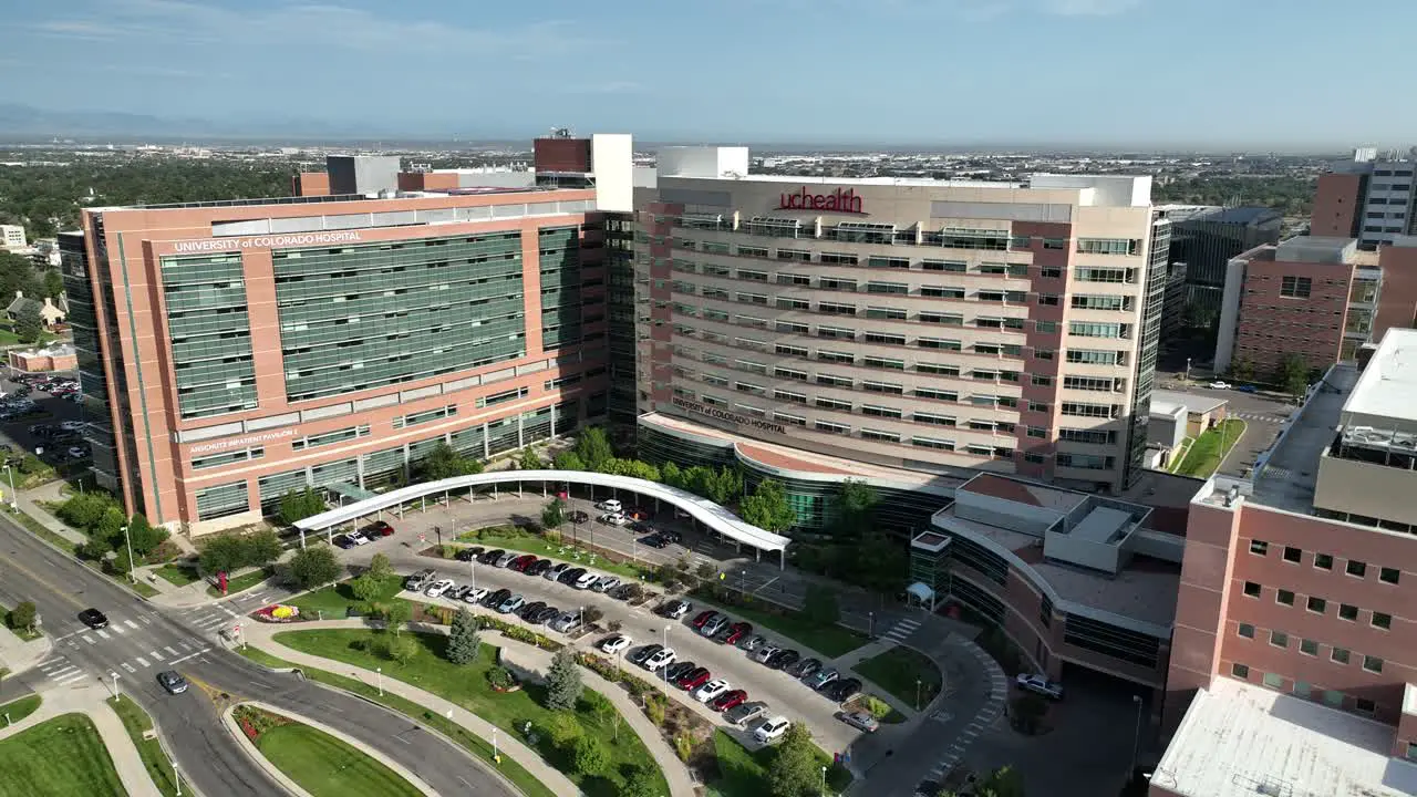 Aerial arc shot in front of UCHealth Anschutz Inpatient Pavilion Aurora