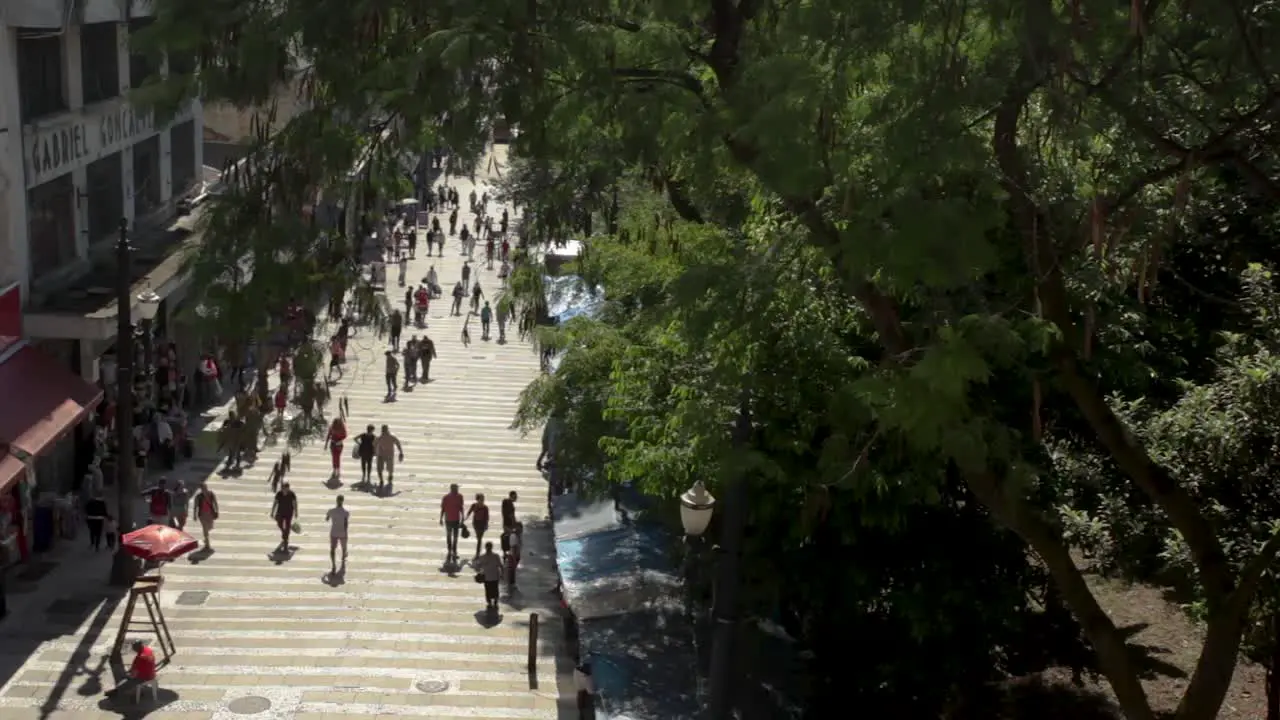 Market street seen from above with harsh sunlight