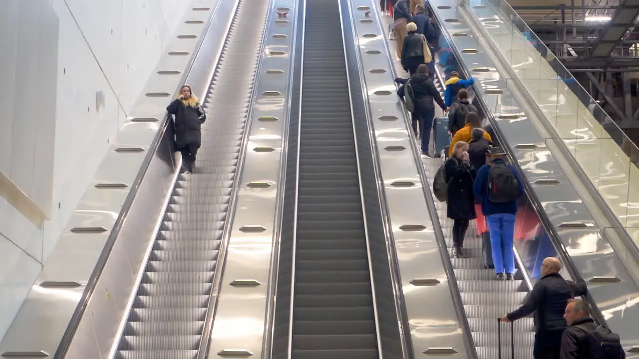 Close up of people on escalator in Helsinki-Vantaa Airport  Finland