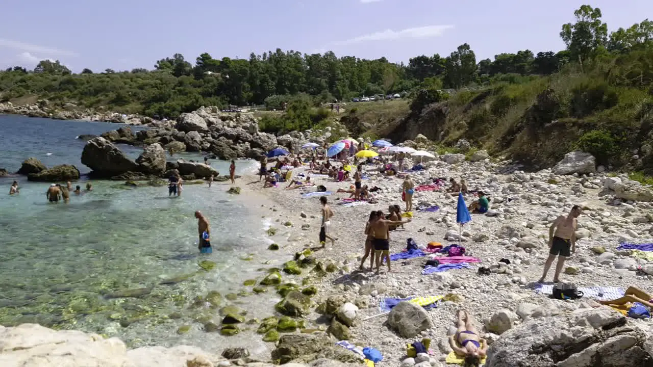 Crowdy Cala Mazzo di Sciacca beach near Scopello Sicily in Italy