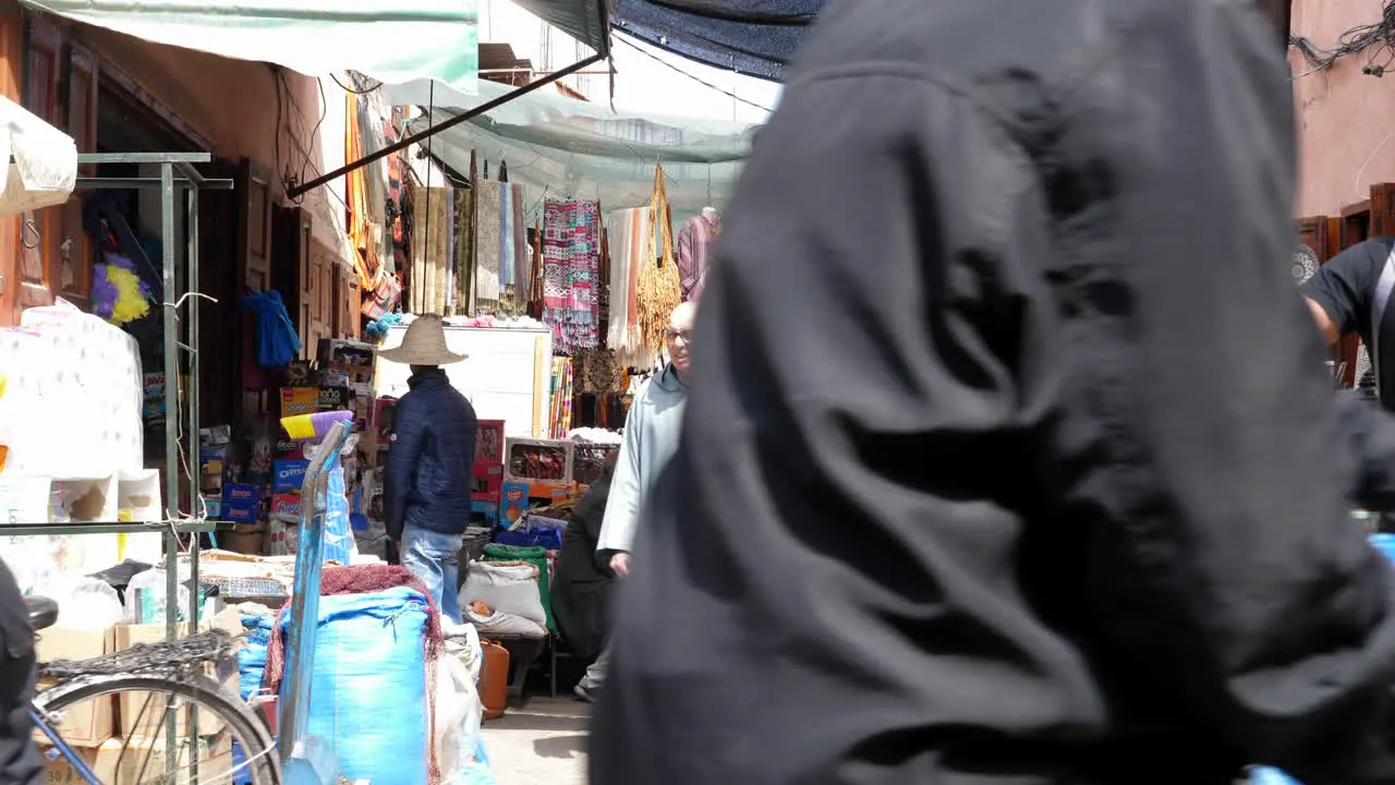 Marrakech street view market people walking by