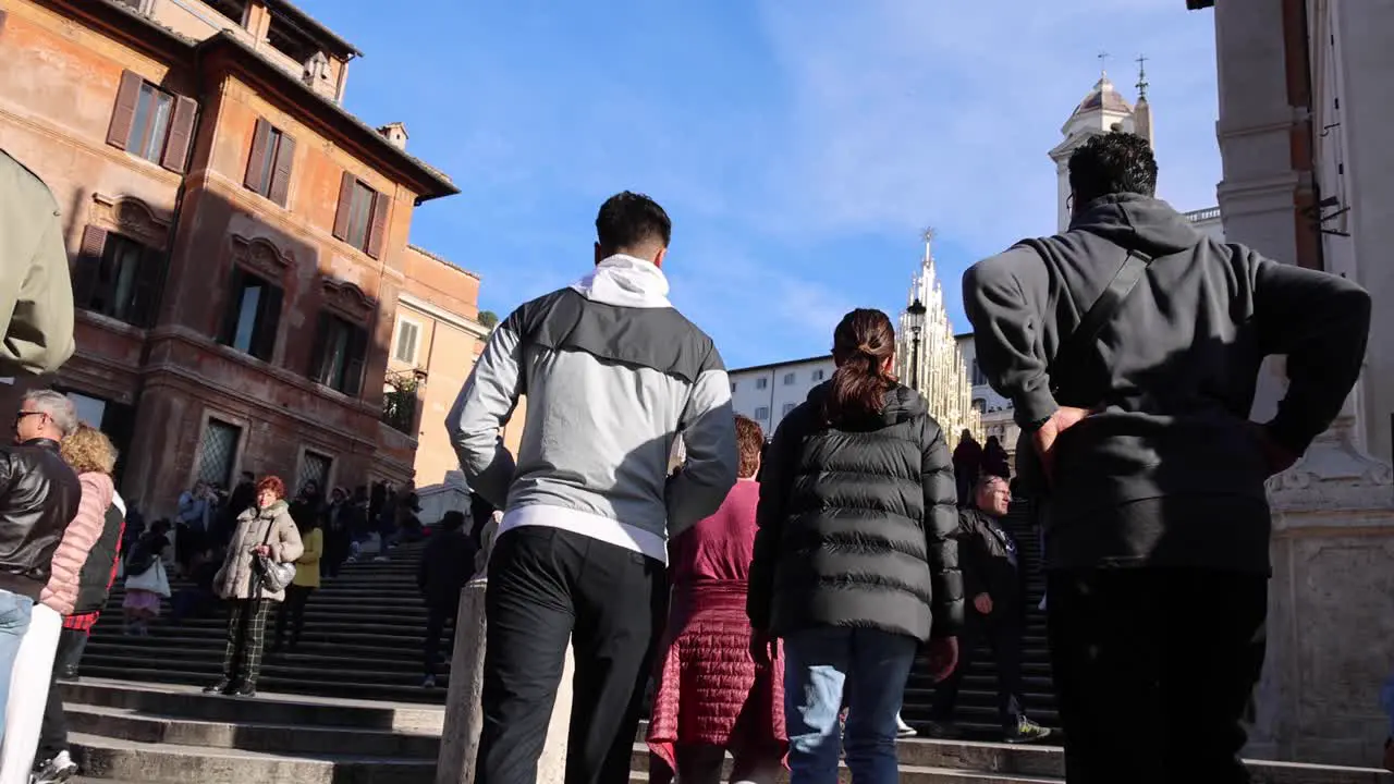 Spanish Steps in Rome Italy during the day with tourists walking in slow motion