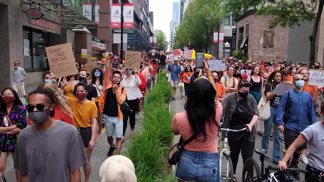 Cancel Canada Day Thousands Of Protesters In Orange Shirt March In Downtown Vancouver With Placards In Canada