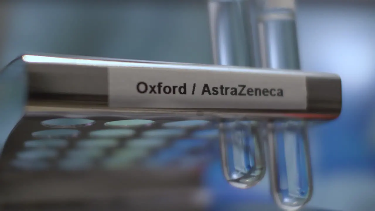 Oxford AstraZeneca Covid Vaccine Test Tube Vials Being Placed Into Rack