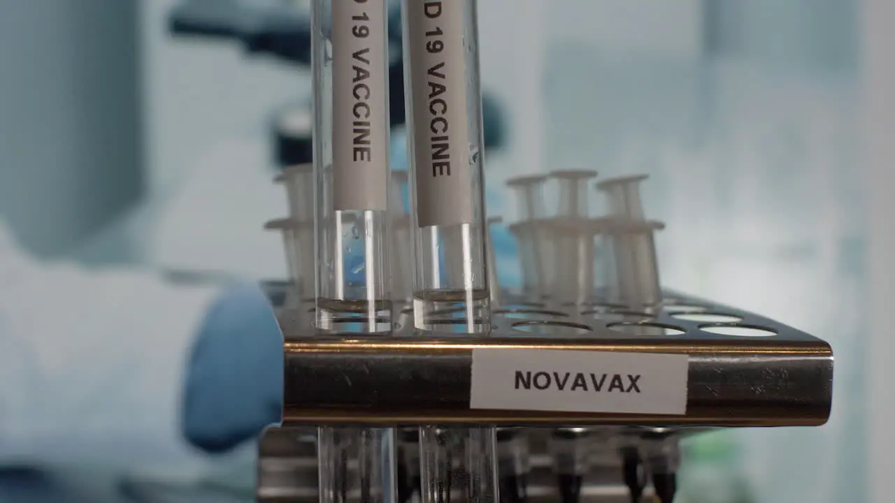 Novavax Covid Vaccine Test Tube Vials Being Placed Into Rack