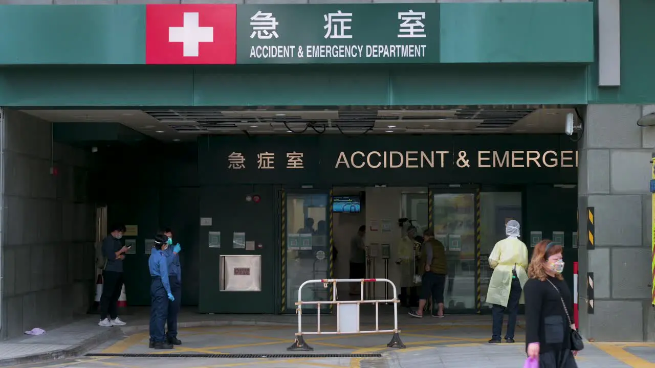 View of an accident and emergency room entrance of a hospital as healthcare workers standby during a Covid-19 virus variant wave