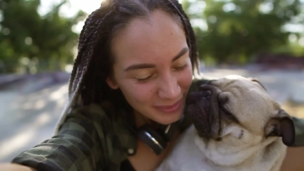 Young Girl Holding Her Dog