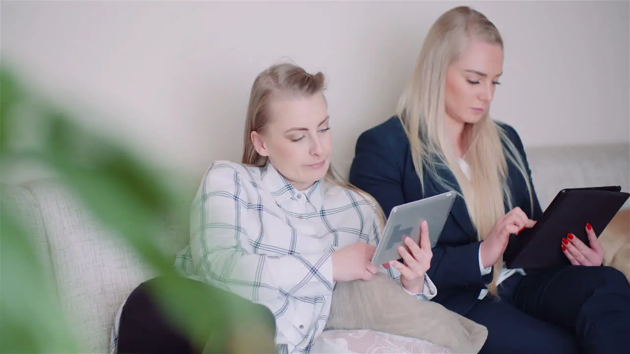 Businesswomen Discussing Over Technologies In Office Businesswomen Working On Digital Tablet 3