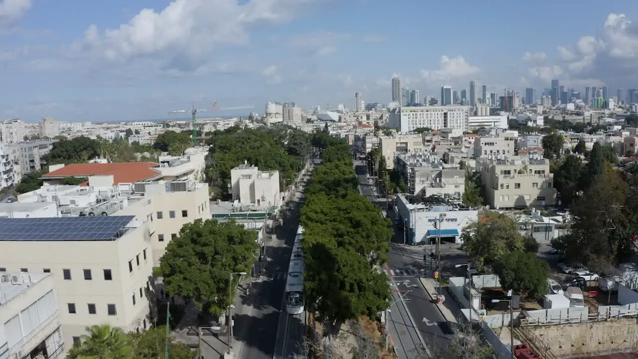 New light train passing through Tel Aviv mass transit in suburban area