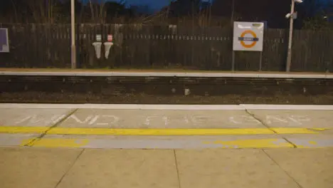 Mind The Gap Warning On Edge Of Empty Platform At Railway Station In Early Morning 1