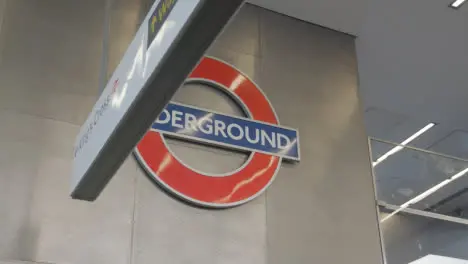 Station Sign And Logo For King's Cross Underground Tube Station London UK 1