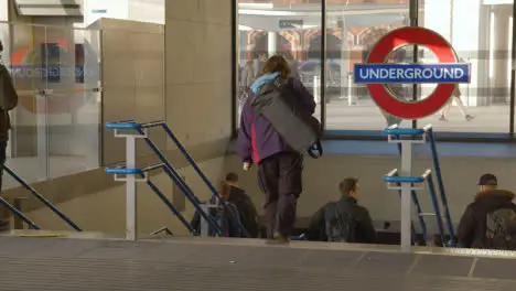 Entrance To King's Cross Underground Tube Station London UK With Commuters 1