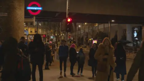 Entrance To London Bridge Underground Tube Station UK Busy With People At Night