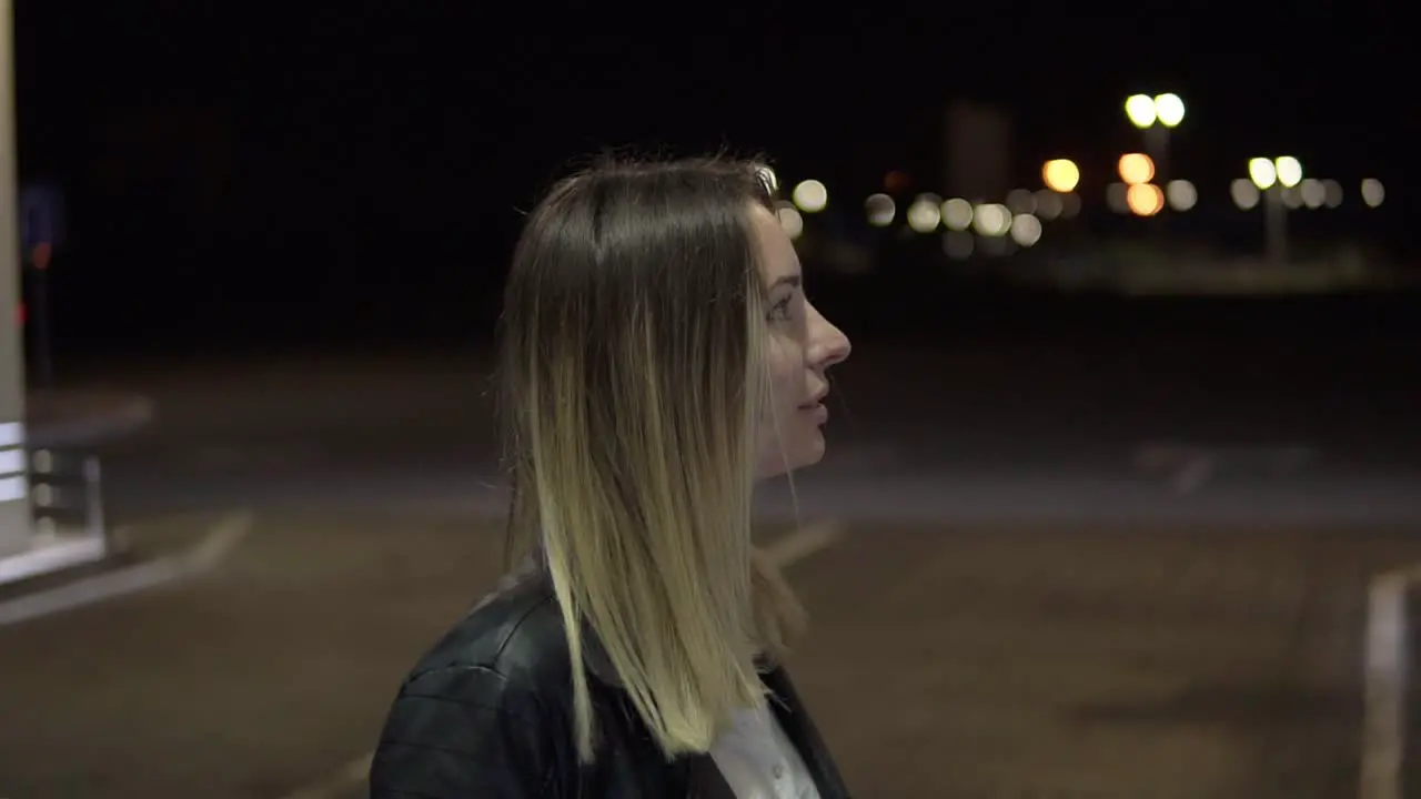 Blonde Woman Leaning On Car