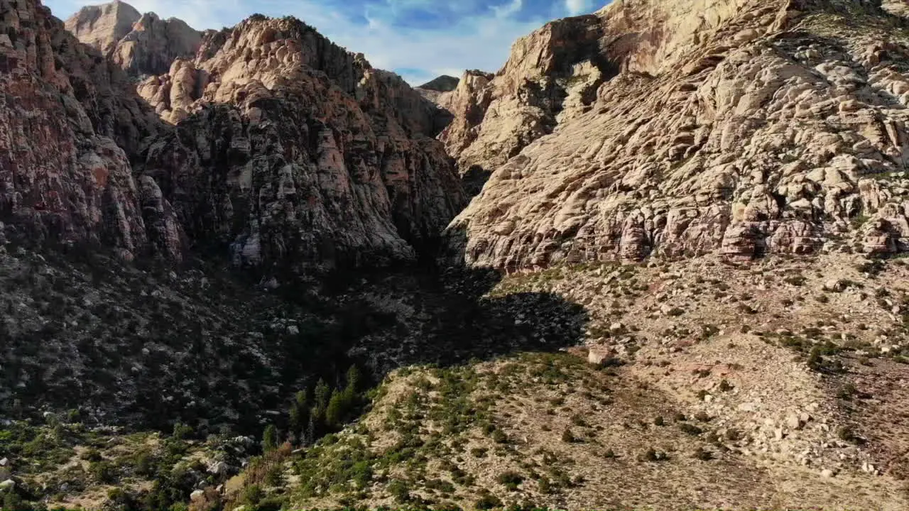 Aerial pullback shot of mountains at Red Rock Canyon Park in Nevada