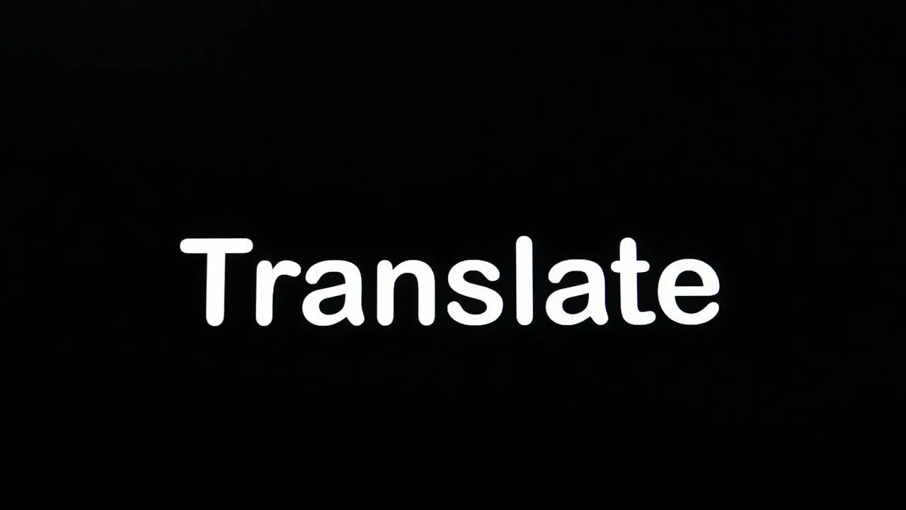 Typing on the screen with a flashing paragraph forming the word Translate in white on a black background