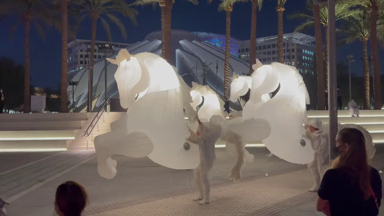 Artists performing with inflatable horses at EXPO Dubai 2020