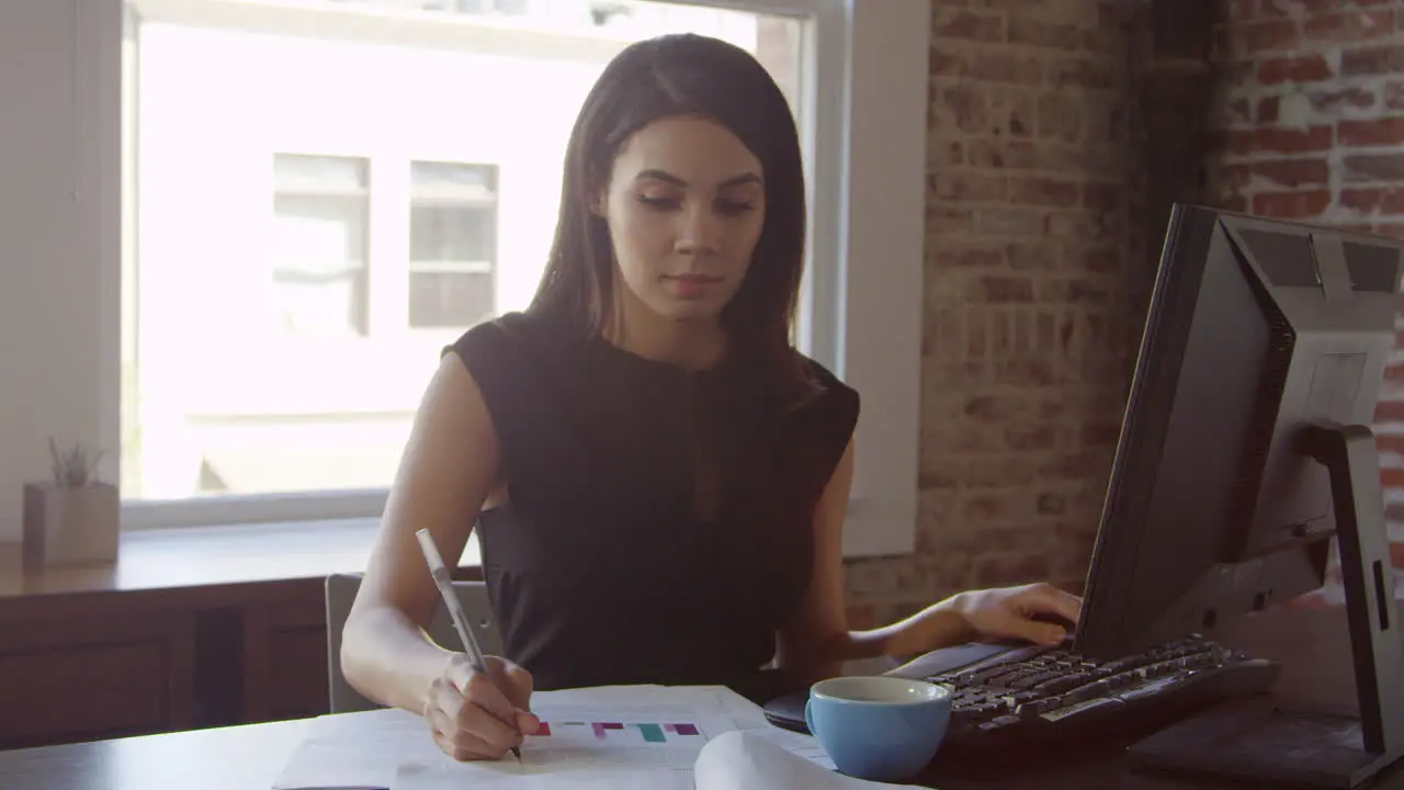 Businesswoman Works On Computer In Office Shot On R3D