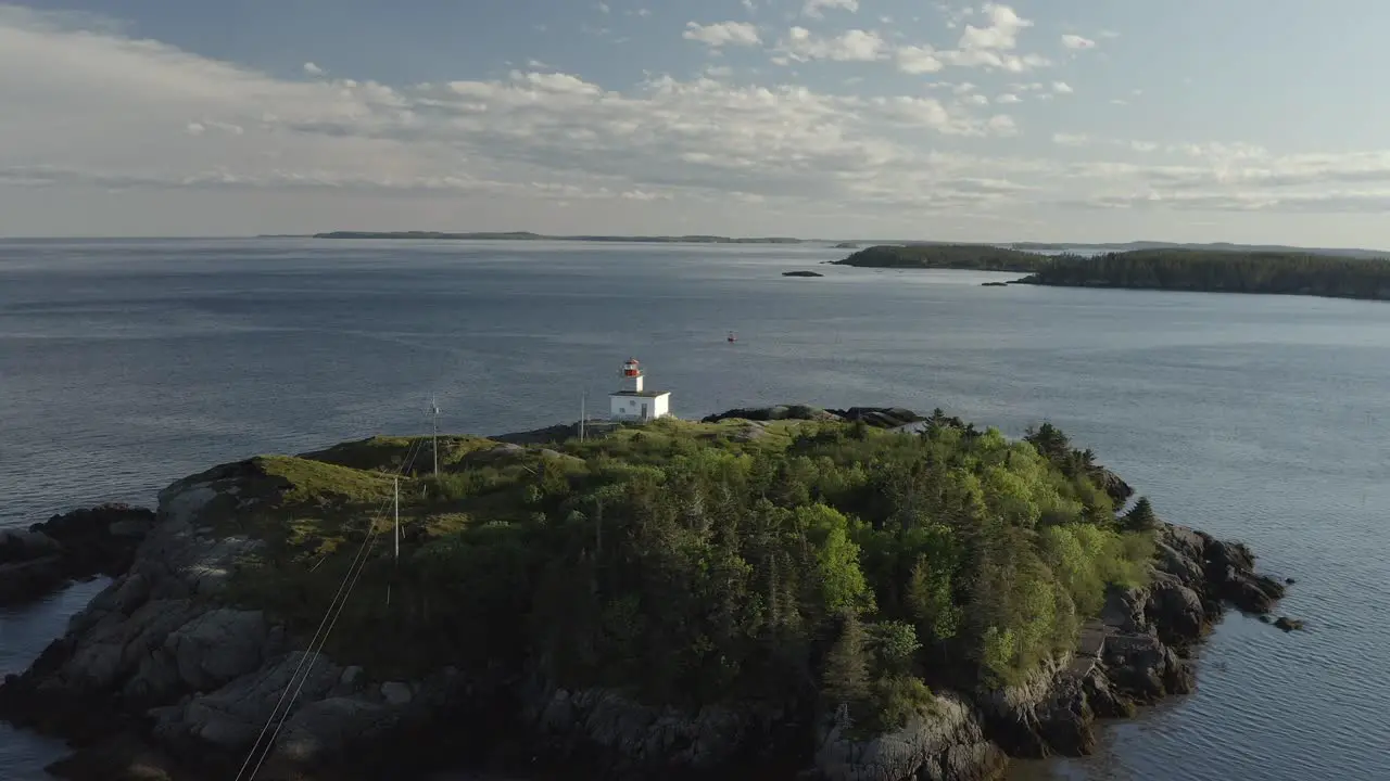 Push in pan left to lighthouse