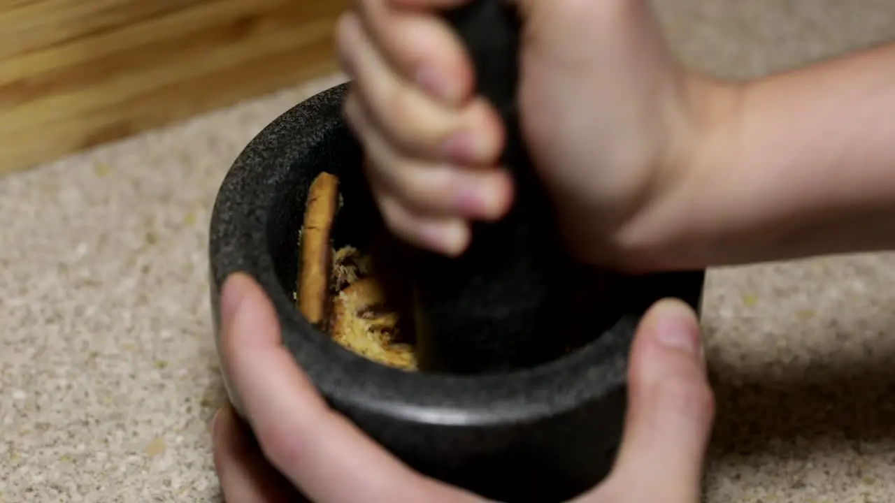 Breaking down chocolate coated biscuits