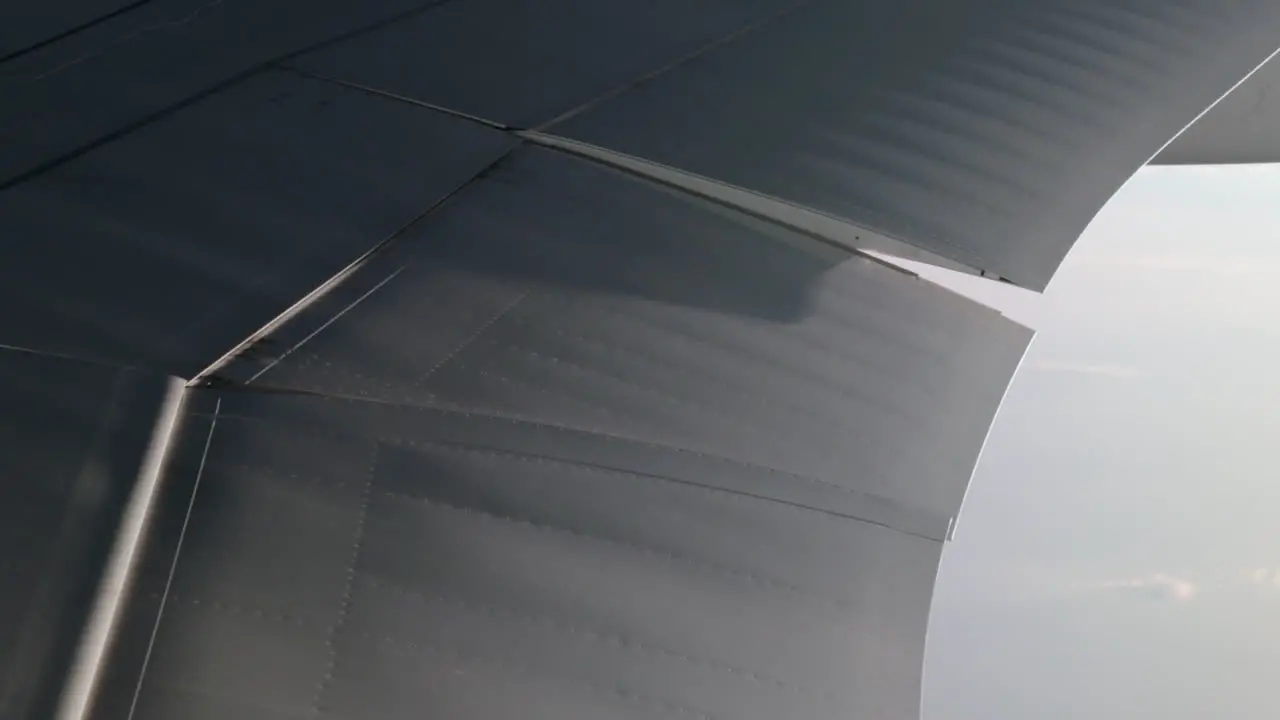 Inboard aileron moving on airplane wing inflight correction