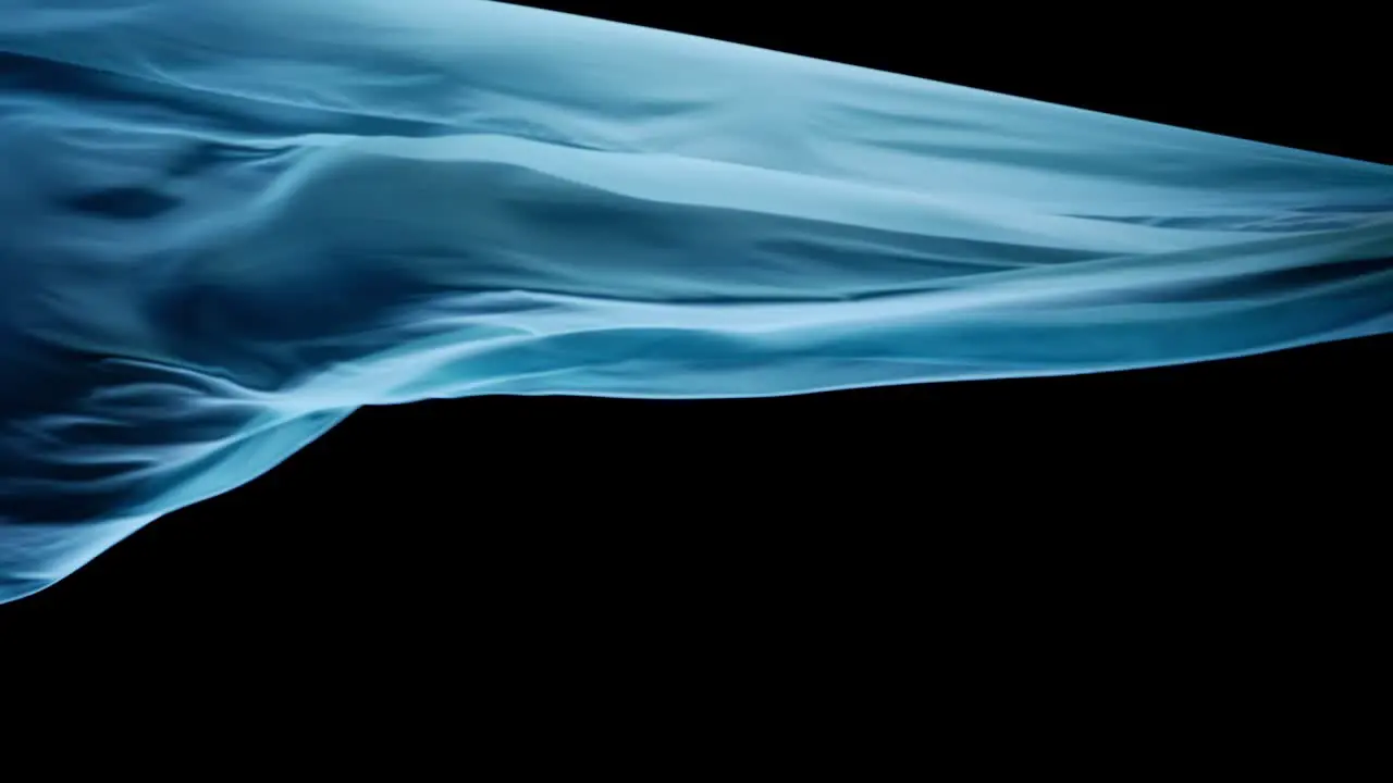 Light Blue Silk In Floating Motion Isolated In Black Background studio shot