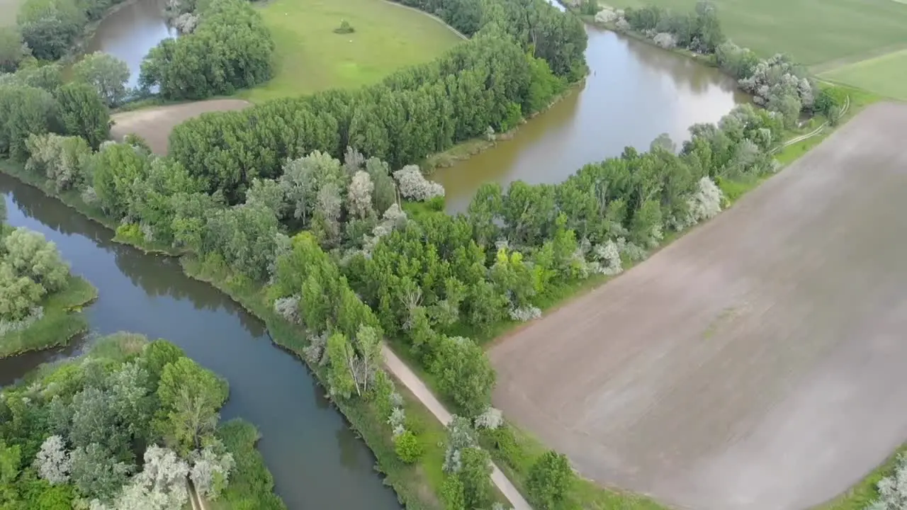 Pull out drone shot from a backwater river bend