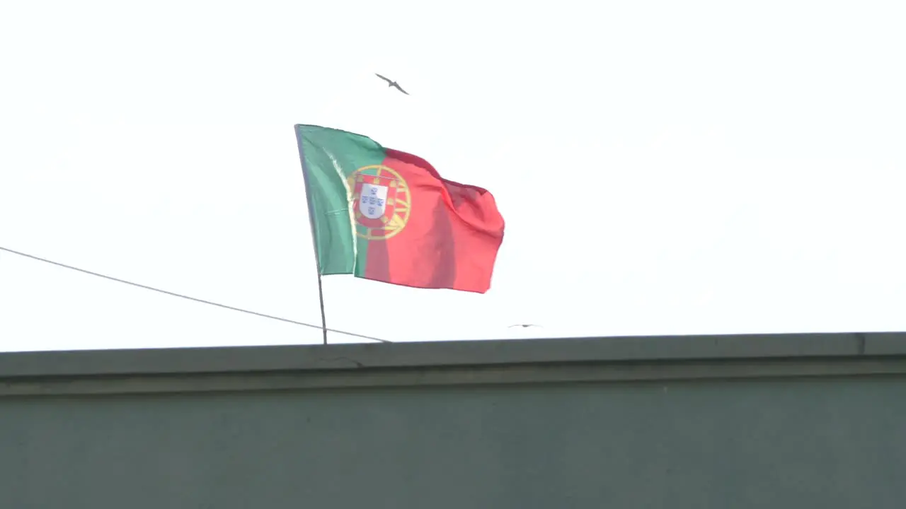 Portugal Flag Waving In Wind On Top Of Building In Malir Karachi