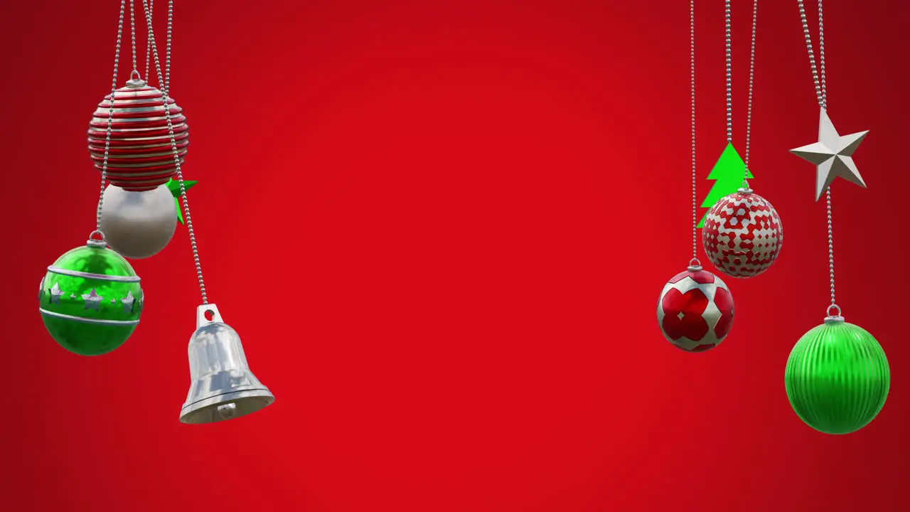 Animation of hanging baubles tress bell swinging against red background