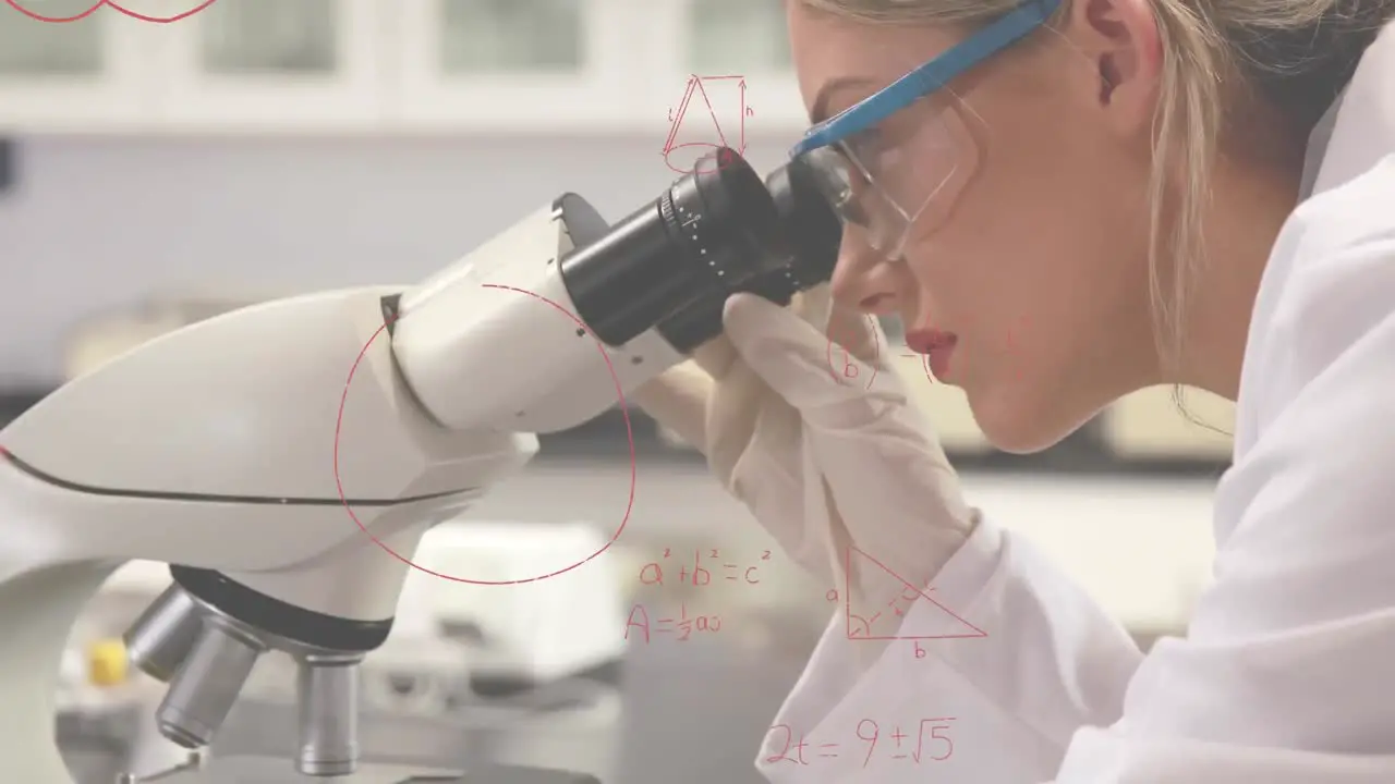 Scientist using the microscope