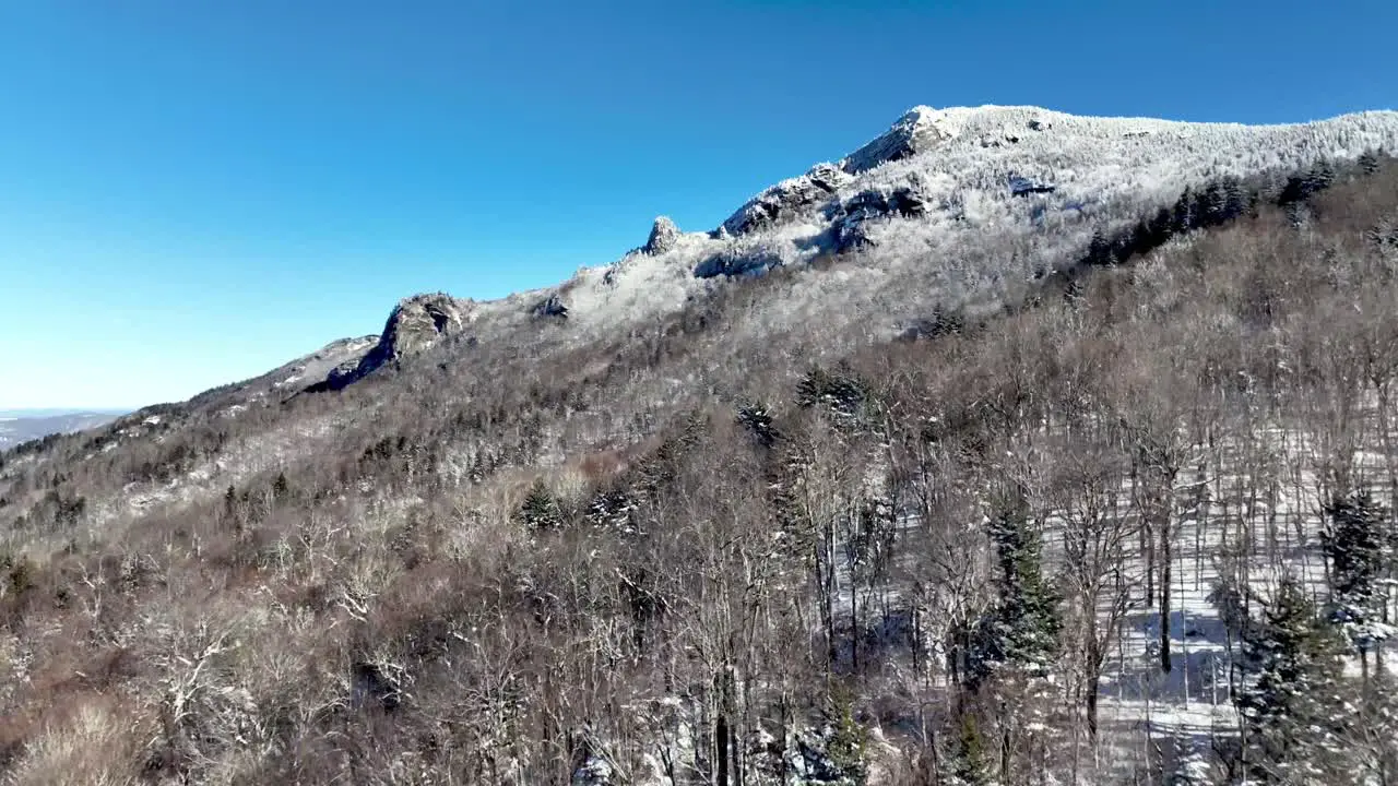 aerial in winter over treetops grandfather mountain nc