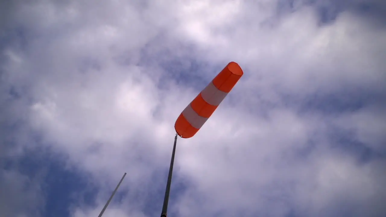 Windsock swaying with the wind on a slightly windy day