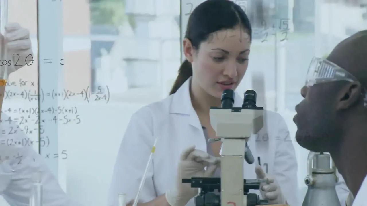 Group of scientist studying together and conducting research