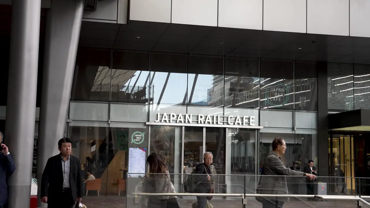 Commuters Walking Past Japan Rail Cafe At Tokyo Station At Yaesu Entrance Side