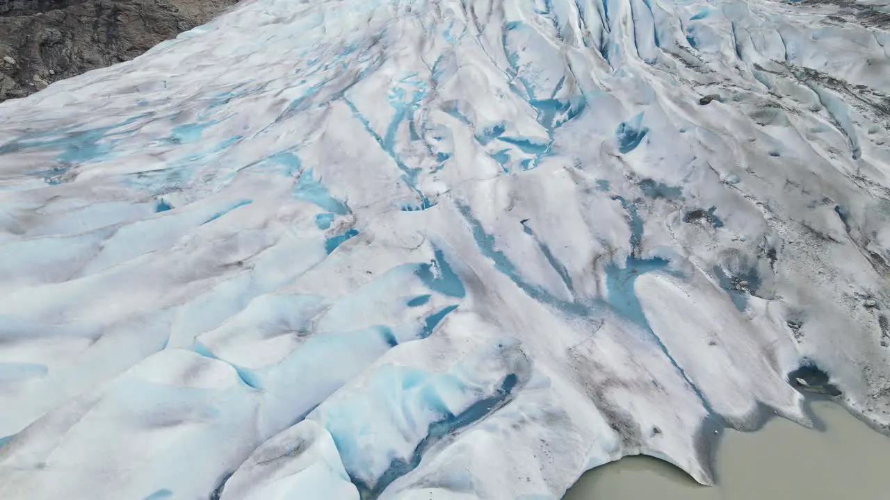 Aerial Fly Over of ice covered Glacier