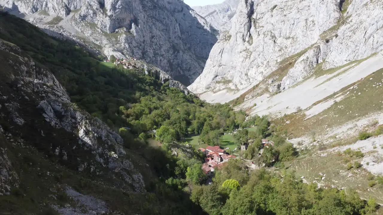 sweet tiny mountain village called Bulnes in Asturias in Spain Drone and sun