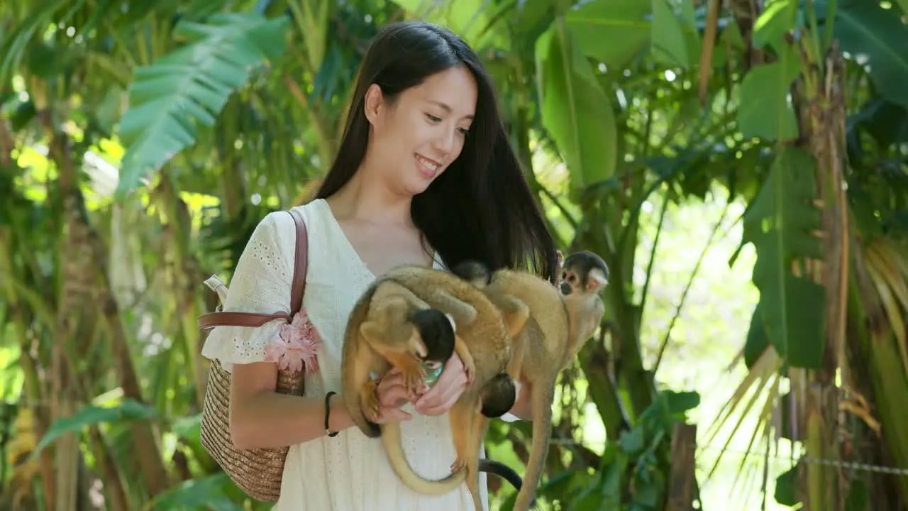 Woman and Squirrel Monkeys