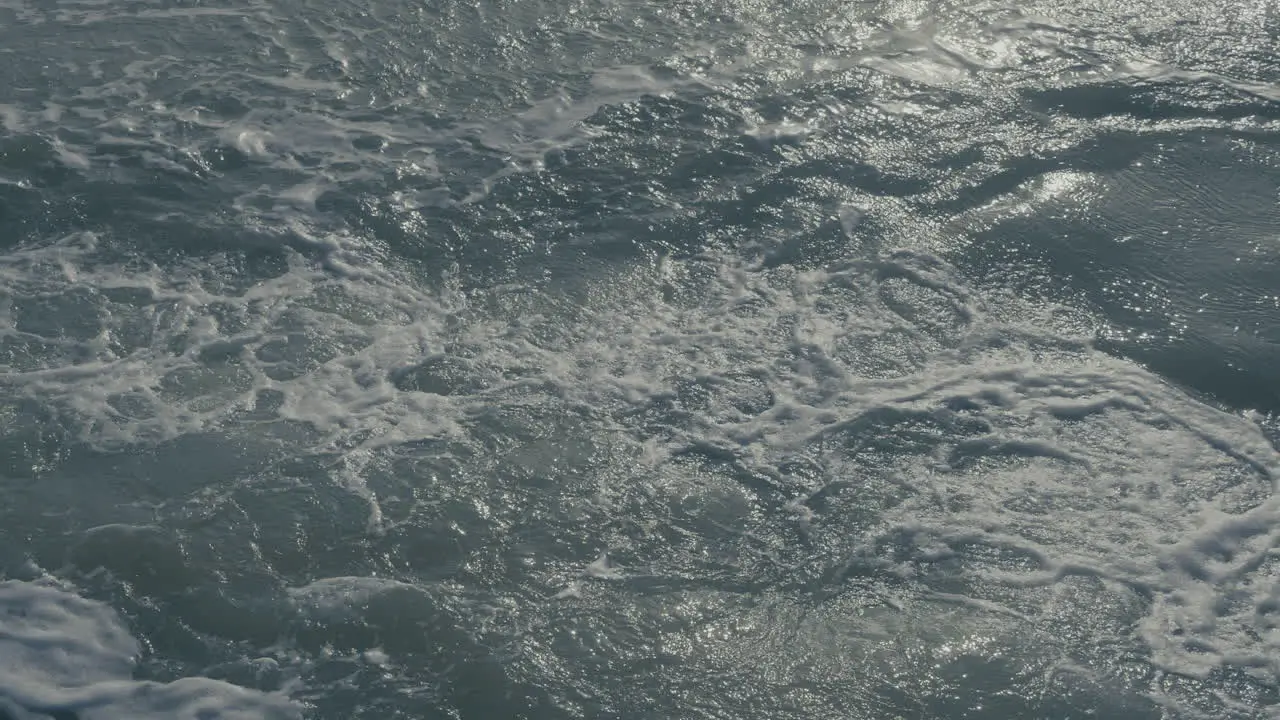 Blue sea churning in slow motion